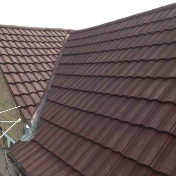 Roof coating on a slate roof